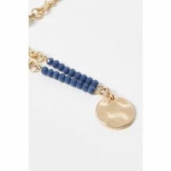 Oliver Bonas Blue Romina Beads And Pearls With Textured Disc Pendant Necklace -Default Template 2 unnamed file 1118