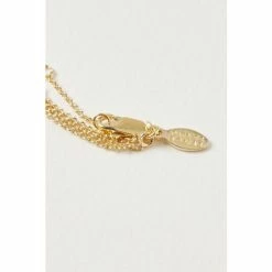 Oliver Bonas Savannah Triple Row Shapes Gold Plated Brass Layered Necklace -Default Template 2 unnamed file 1127