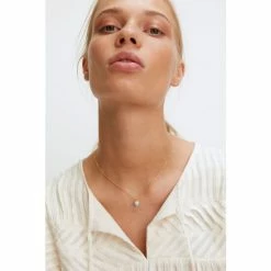 Oliver Bonas Blue Varuna Stone Heart Charm Gold Plated Chain Necklace -Default Template 2 unnamed file 1404