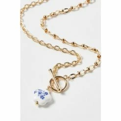Oliver Bonas Audrey Natural Ceramic Flower Pendant T Bar Chain Necklace -Default Template 2 unnamed file 1584