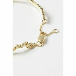 Oliver Bonas Gold Cordelia Multi Flower Casting Curved Lines Gold Plated Bangle -Default Template 2 unnamed file 2093