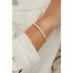 Oliver Bonas Edith Beaded White Pearl Gold Plated Chain Bracelet -Default Template 2 unnamed file 2101