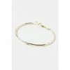 Oliver Bonas Aurora Flower Casting Detail Gold Plate Brass Bangle -Default Template 2 unnamed file 2192