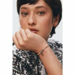 Oliver Bonas Natural Luella Monochrome Beads With Textured Disc Charm Bracelet -Default Template 2 unnamed file 2258