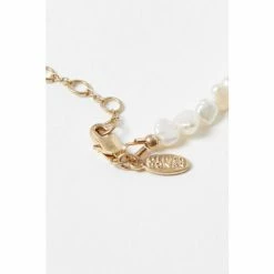 Oliver Bonas Natural Edna Pearl ANd Disc Charm Chain Bracelet 4 Oliver Bonas Natural Edna Pearl ANd Disc Charm Chain Bracelet -Default Template 2 unnamed file 2276