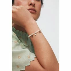 Oliver Bonas Natural Edna Pearl ANd Disc Charm Chain Bracelet 5 Oliver Bonas Natural Edna Pearl ANd Disc Charm Chain Bracelet -Default Template 2 unnamed file 2277