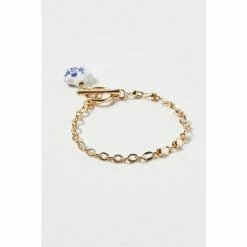 Oliver Bonas Audrey Natural Floral Pendant Chain Bracelet -Default Template 2 unnamed file 2305