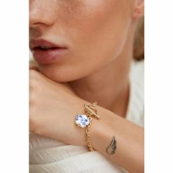 Oliver Bonas Audrey Natural Floral Pendant Chain Bracelet -Default Template 2 unnamed file 2306