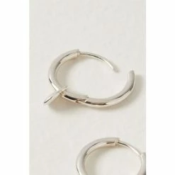 Oliver Bonas Silver Tone Heart Charm Huggie Earrings -Default Template 2 unnamed file 771