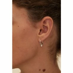 Oliver Bonas Silver Tone Heart Charm Huggie Earrings -Default Template 2 unnamed file 773