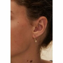 Oliver Bonas Gold Plated Brass Heart Charm Huggie Earrings -Default Template 2 unnamed file 942